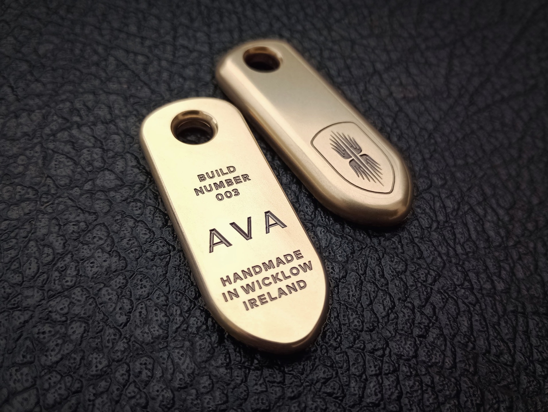 Individually numbered brass key-fobs