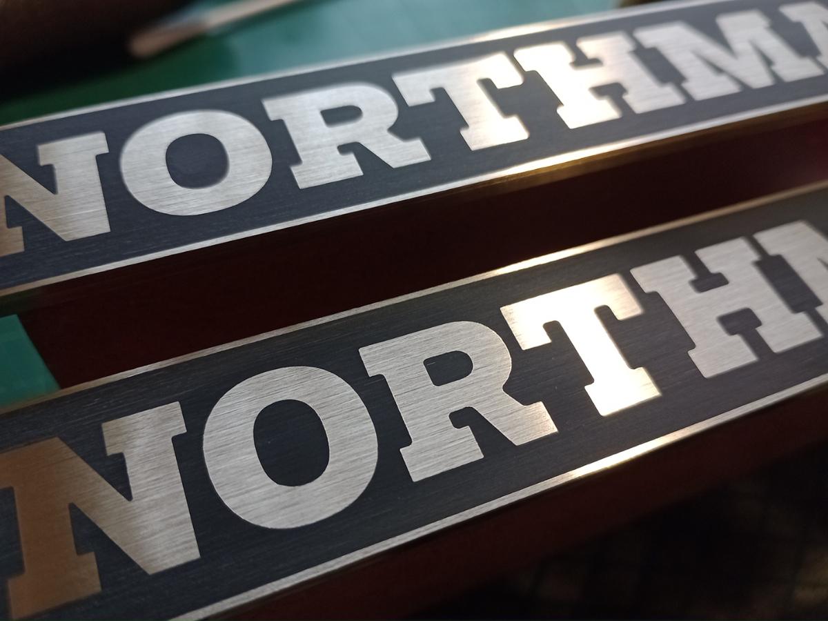 Custom Northman GB350 tank badge with resin and sanded back